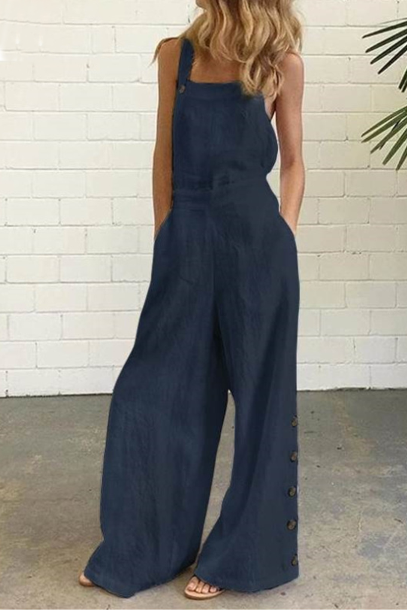 Devon - Avslappnad, enfärgad jumpsuit med fyrkantig krage och spänne