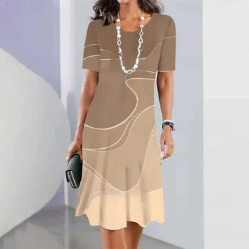 Beverly - Vacker klänning med marmormönster