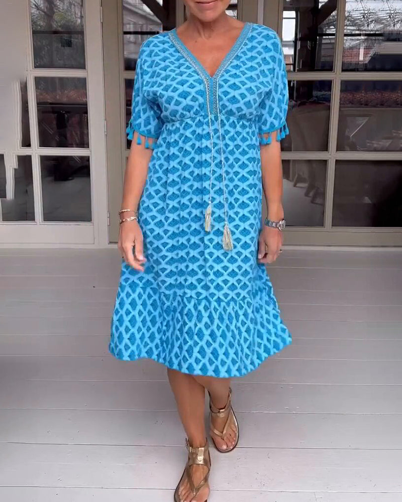 Delina | V-Ringad Klänning Med Tryck Och Fransar