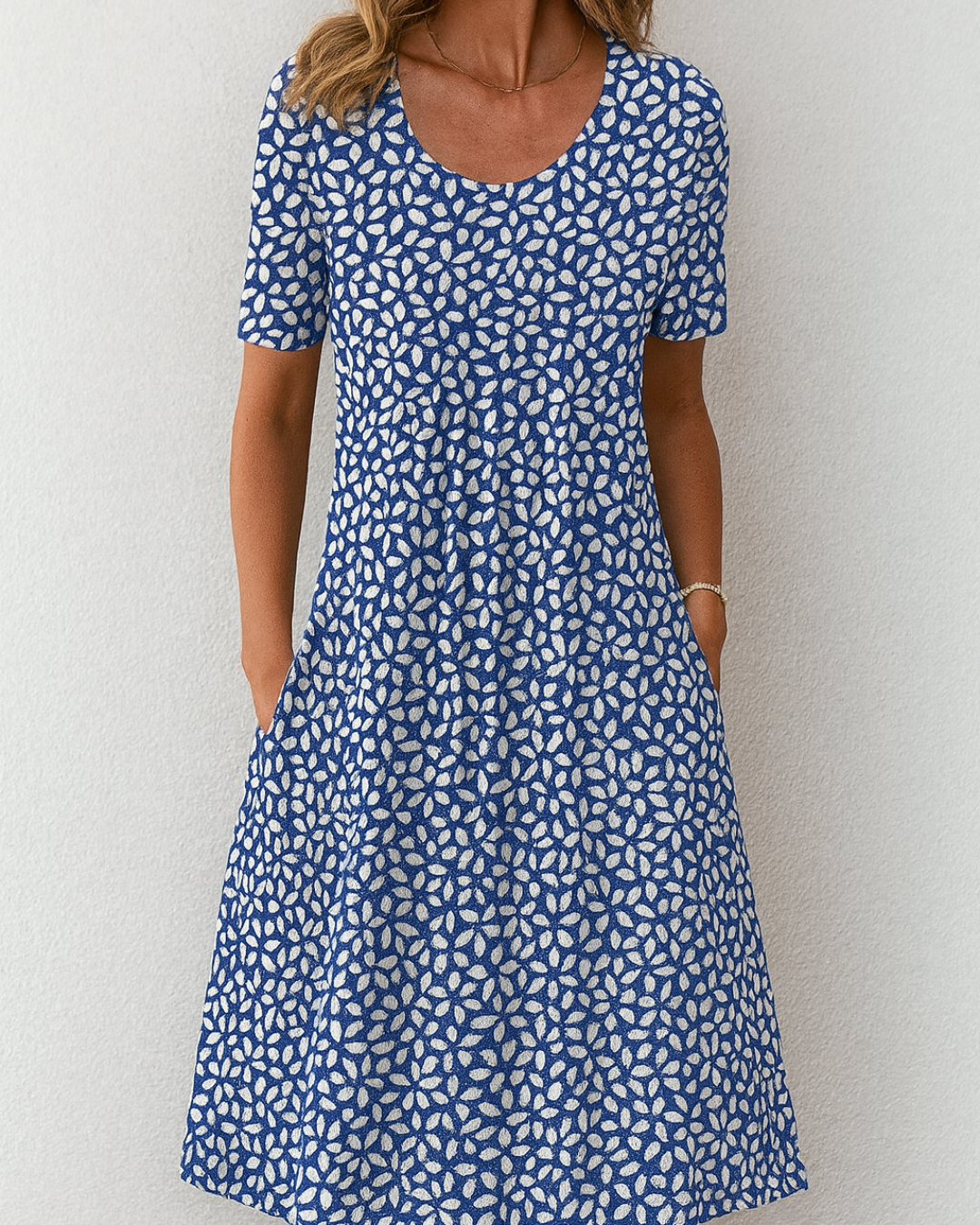 Alva | Stilfull Blommig Klänning Med Fickor