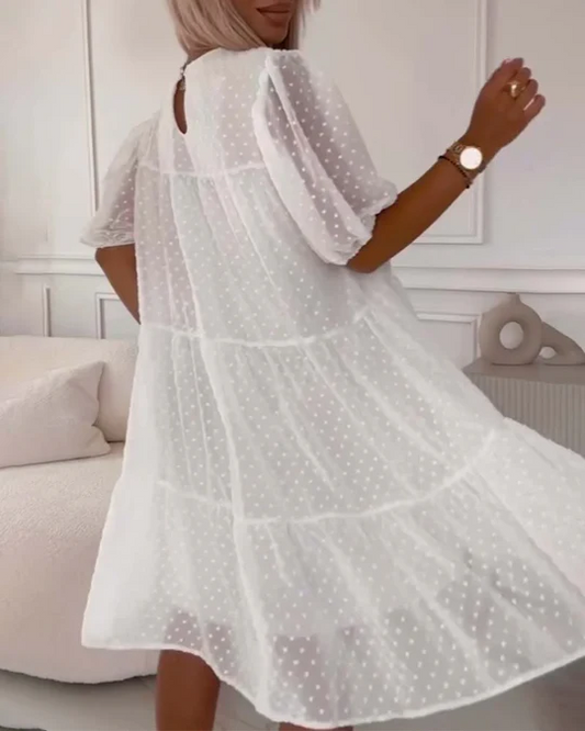 Delphi - Elegant vit klännin