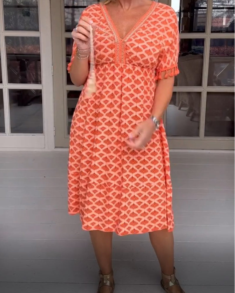 Delina | V-Ringad Klänning Med Tryck Och Fransar