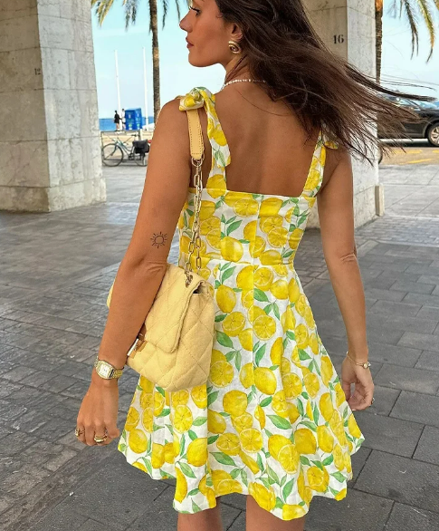 Dolly- Ladies chic citronfärgad miniklänning med tryck somma