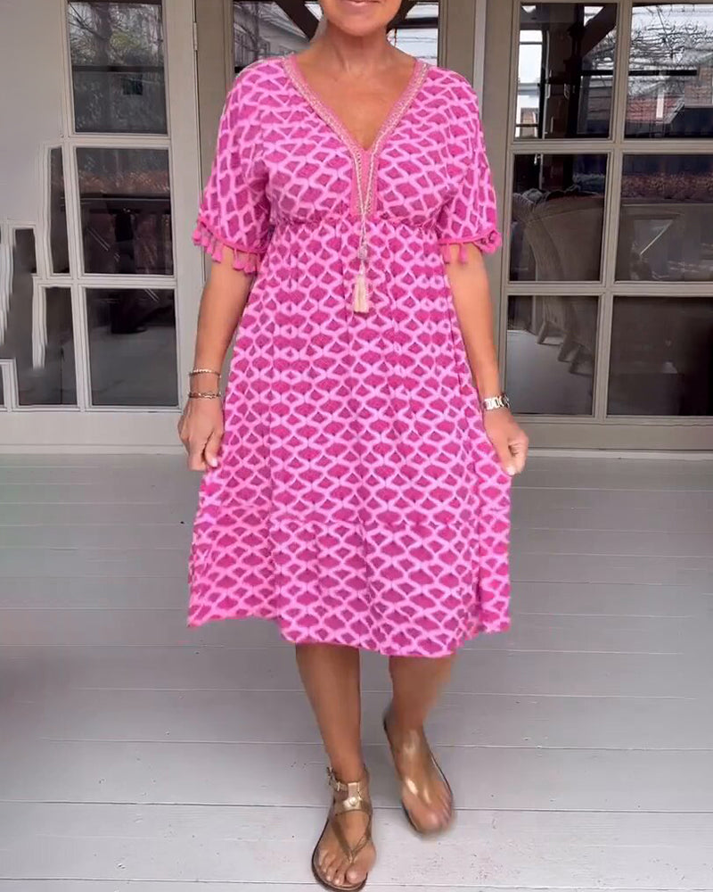 Delina | V-Ringad Klänning Med Tryck Och Fransar