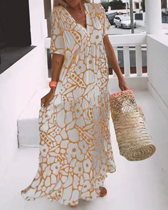 Juni | Ibiza Stil Klänning Med Bohemiskt Blomtryck