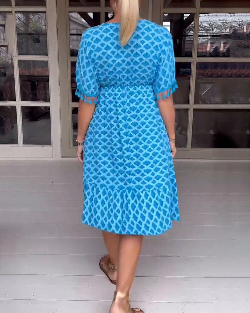 Delina | V-Ringad Klänning Med Tryck Och Fransar