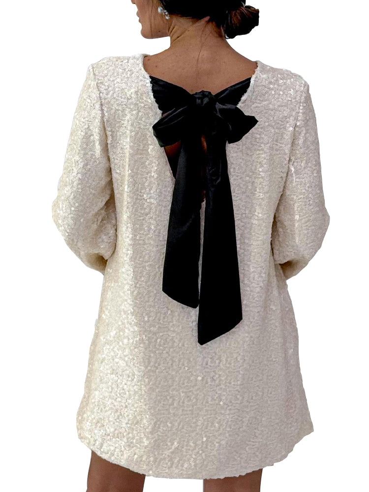 Nora | Elegant paljettklänning med rosett