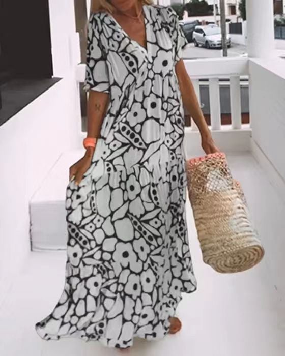 Juni | Ibiza Stil Klänning Med Bohemiskt Blomtryck