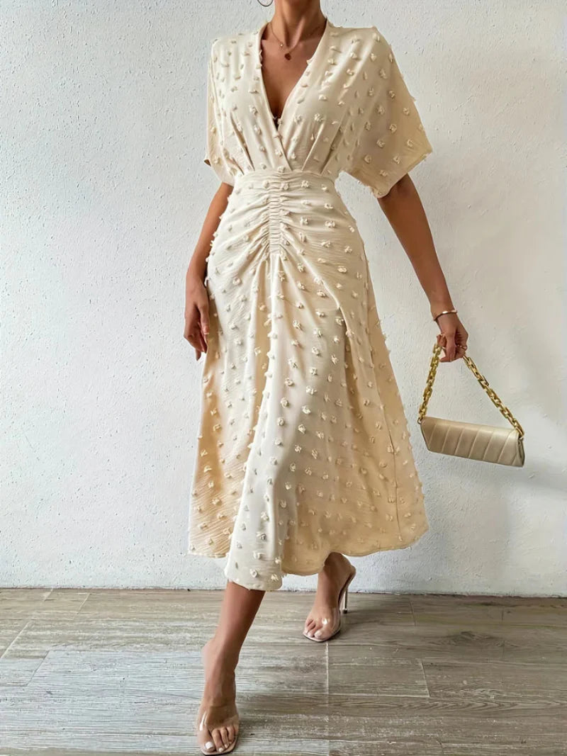 Alma | Prickig Plisserad Midi Klänning För Formella Tillfällen