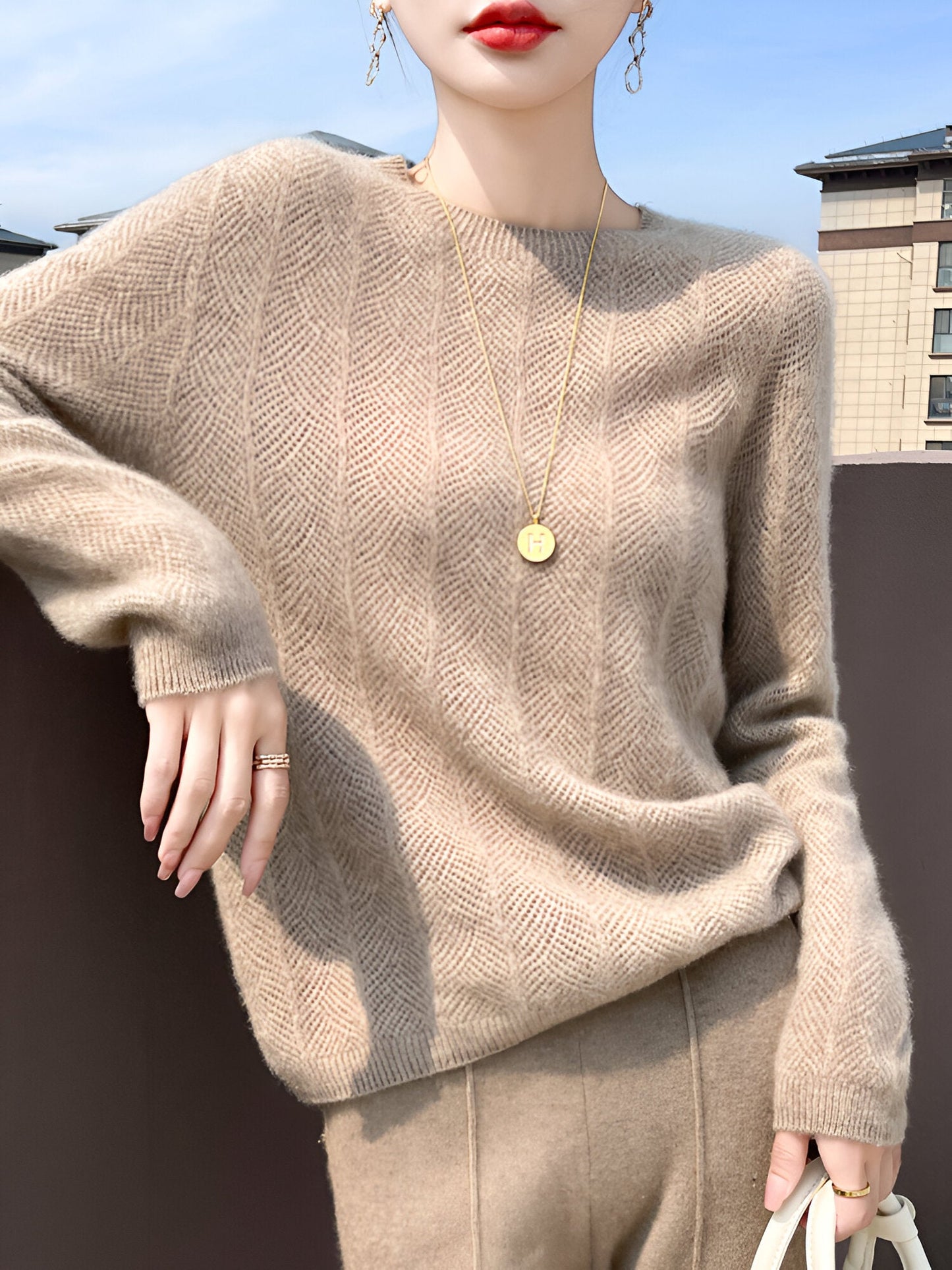 Zora |  Jumper i merinoull med eleganta utskärningar
