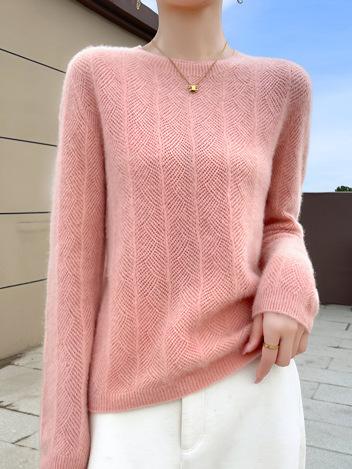Zora |  Jumper i merinoull med eleganta utskärningar