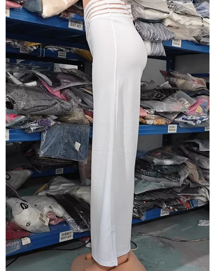 Corine | Stilrena Höga Flared Byxor med Korsade Detaljer