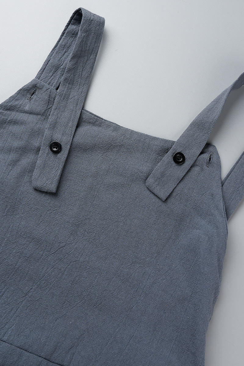 Devon - Avslappnad, enfärgad jumpsuit med fyrkantig krage och spänne