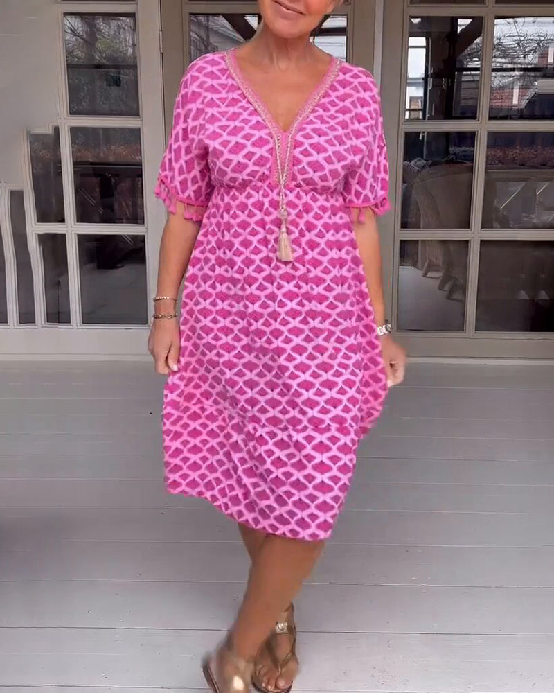 Delina | V-Ringad Klänning Med Tryck Och Fransar