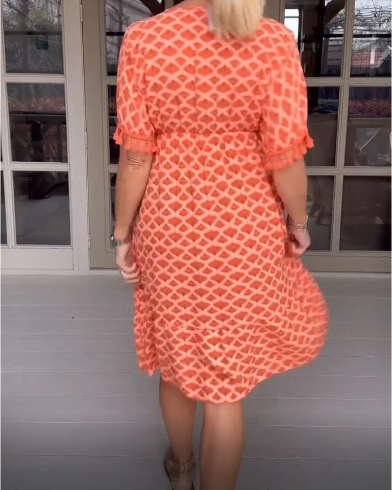 Delina | V-Ringad Klänning Med Tryck Och Fransar