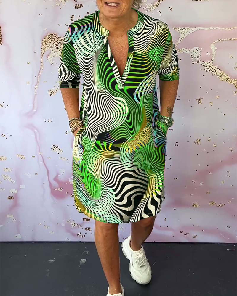 Leonie | Färgstark Klänning Med V-Ringning