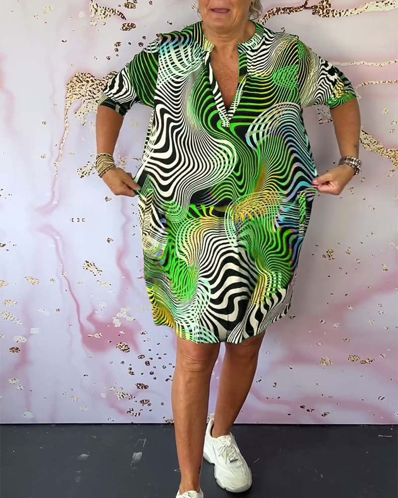 Leonie | Färgstark Klänning Med V-Ringning