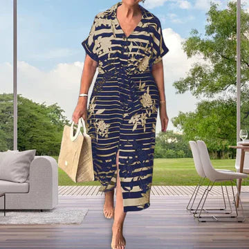 Henrietta - Kortärmad klänning med slitsad fål