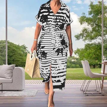 Henrietta - Kortärmad klänning med slitsad fål