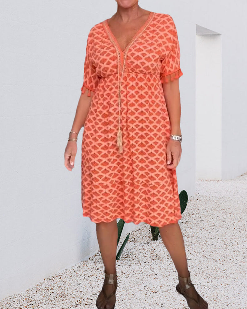 Delina | V-Ringad Klänning Med Tryck Och Fransar