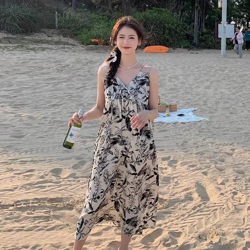Lize - Blommig strandklänning med V-ringning