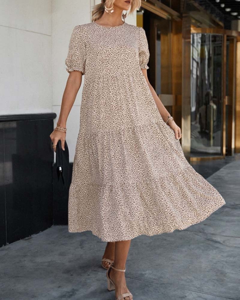Dallas - Elegant klänning med rund halsringning och puffärmar
