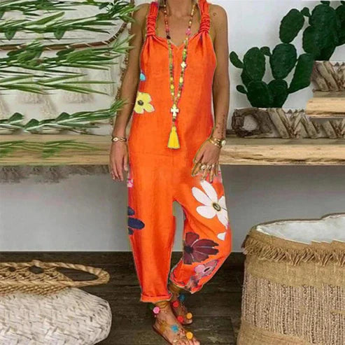 Devin - Rygglös jumpsuit med blommigt tryc