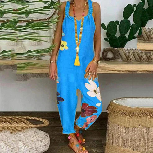 Devin - Rygglös jumpsuit med blommigt tryc